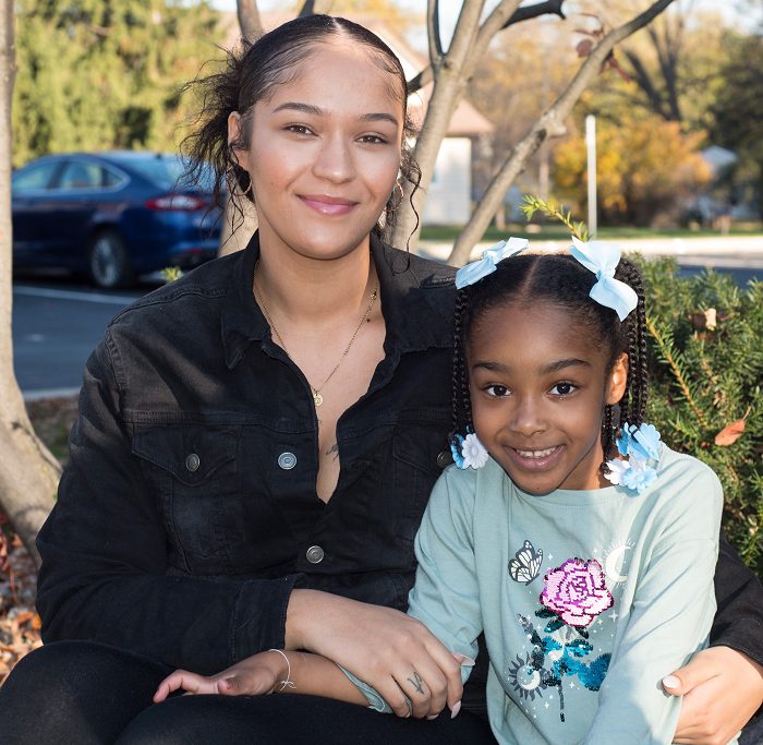 past resident with her child